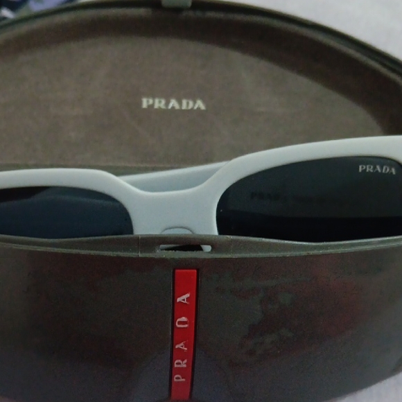 Prada Gray Sunglasses with Dark Lenses - Picture 9 of 10